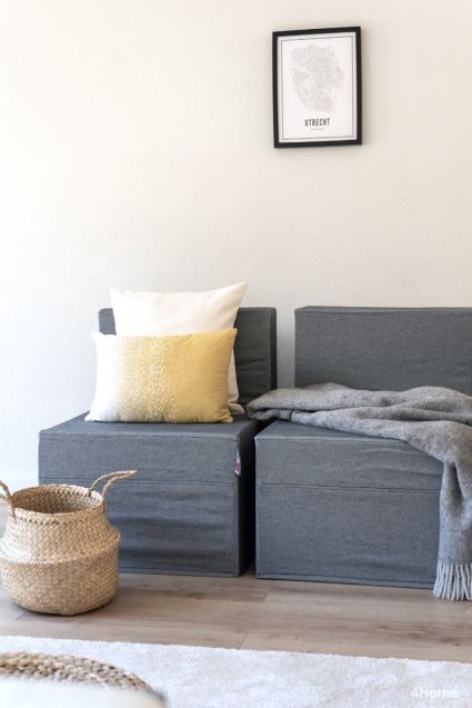 Exclusive fabric slipcovers for cardboard chair available in various colours.